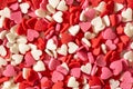 Red white pink hearts background, valentine`s day concept, pastry sprinkle Royalty Free Stock Photo