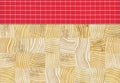 Red white plaid napkin on pine wooden floor table or cutting board Royalty Free Stock Photo