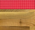 Red white plaid napkin on walnut wooden floor table or cutting board Royalty Free Stock Photo