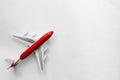 Red white plane on white background top view with copy space Royalty Free Stock Photo