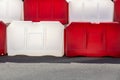 Red and white plastic road blocks close up Royalty Free Stock Photo