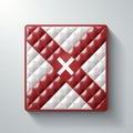 a red and white quilted square with an x on it