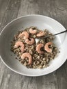 Red and white quinoa with fresh prawns