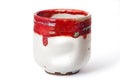 Red and white raku cup
