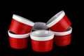 Red and White Ramekins Isolated on Black Royalty Free Stock Photo