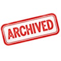 Red and white rectangular stamp with the word archived in bold red lettering isolated on white background Royalty Free Stock Photo