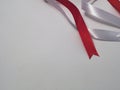 Red and white ribbons on a white background,decorated for indonesian independece day