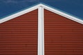 Red and white roofline pointing skyward