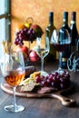 Red, white and rose wine with a charcuterie board of fine meats and cheese. Royalty Free Stock Photo