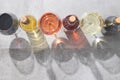 Red, white and rose wine in wine glasses and bottles with deep shadows on concrete background with copy space. Wines concept Royalty Free Stock Photo