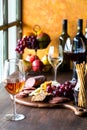 Red, white and rose wines served with gourmet meats and cheese. Royalty Free Stock Photo