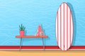 red and white shortboard in front of pastel blue wall Royalty Free Stock Photo