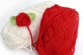 Red and white skein with crochet rose