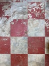 Red and White square painted, distressed and grunge concrete floor surface Royalty Free Stock Photo