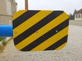 red and white striped barrier tape