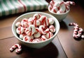 Red and White Striped Candies on Wooden Surface Royalty Free Stock Photo