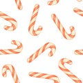 Red and white striped candy canes on a white background. Christmas seamless pattern with candy canes Royalty Free Stock Photo