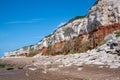 Red and white striped cliffs at Hunstanton, Norfolk, caused by layers of different coloured rock