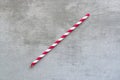 Red and white striped drinking straw