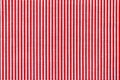 Red and white striped fabric texture. Bright colored cotton background Royalty Free Stock Photo