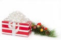 Red and White Striped Gift with White Ribbons Royalty Free Stock Photo