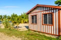 Red & white striped house on Caribbean beach Royalty Free Stock Photo