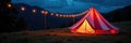 Red and white striped tent at night, string lights glowing , white, outdoor Royalty Free Stock Photo