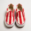 Red And White Striped Vans Slippers A Unique Blend Of Vignetting, Mori Kei, And Industrial Design