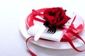 Red and white table setting for diner anniversary celebration Royalty Free Stock Photo