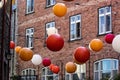 Red white tan and white decorative ball lamps inside Quebec City