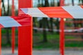 Red white tape isolation object around sport play ground area
