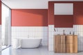 Red and white tile bathroom interior, tub and sink Royalty Free Stock Photo