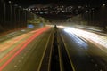 Traffic headlights blur on road at night Royalty Free Stock Photo