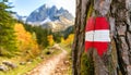 Red and White Trail Sign on a Tree Trunk - Mountain Path - Generative Ai Royalty Free Stock Photo