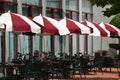 Red/White umbrellas and outside tables in Portland, Oregon