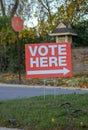 Vote here sign on election day Royalty Free Stock Photo