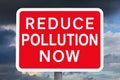 Warning sign REDUCE POLLUTION NOW