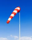 a red and white windsock