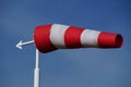 Red and white windsock - wind vane Royalty Free Stock Photo