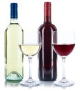 Red and white wine bottles beverage glasses isolated Royalty Free Stock Photo