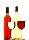 Red and White Wine Bottles and Filled Glasses Royalty Free Stock Photo