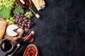 Red and white wine, grape, cheese and sausages Royalty Free Stock Photo
