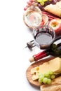 Red and white wine, grape, cheese and sausages Royalty Free Stock Photo