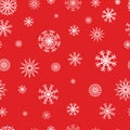 Red and white winter seamless background with plain openwork falling snowflakes Royalty Free Stock Photo