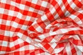 Red and white wrinkled checkered tablecloth