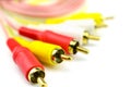 Red, white and yellow male cinch plugs Royalty Free Stock Photo