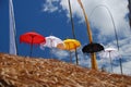 Red,white , yellow, strips beach umbrella Royalty Free Stock Photo