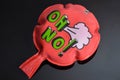 Red whoopee cushion with reflection on black glass Royalty Free Stock Photo