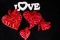 Red wicker heart has a black background, the day of lovers Royalty Free Stock Photo