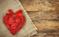 Red wicker heart with roses and ribbon, canvas napkin